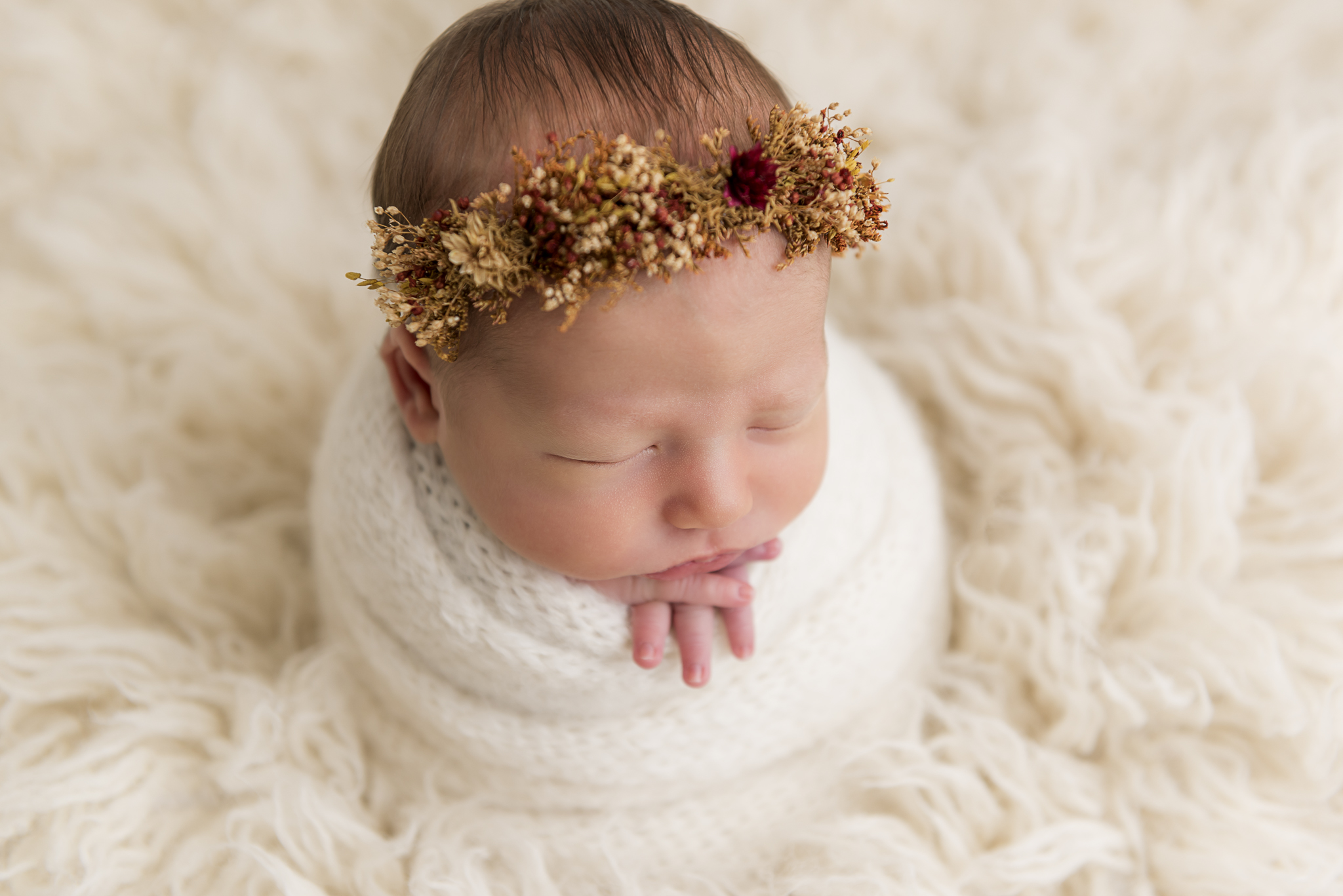 Swaddled newborn photography in Fall floral halo